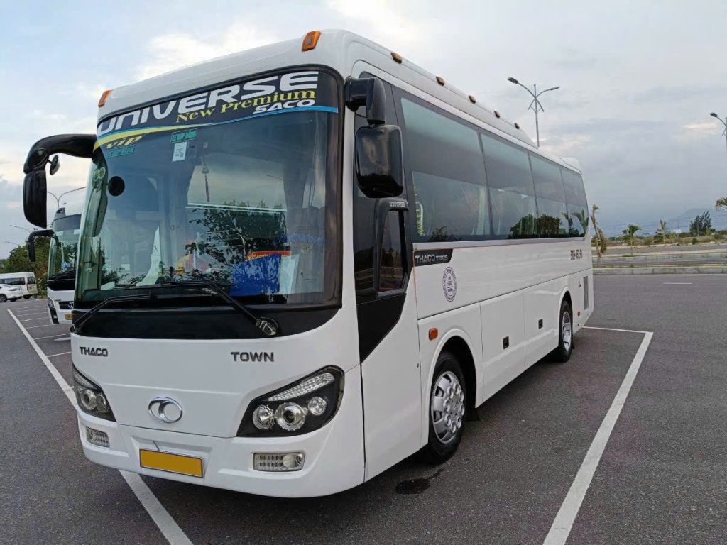 Comfortable 29-seater passenger bus fleet ready for group arrivals at Cam Ranh International Airport