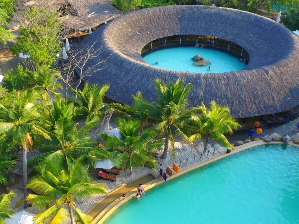 Relaxing natural hot mineral mud bath tubs and hydrotherapy waterfalls at I-Resort Nha Trang