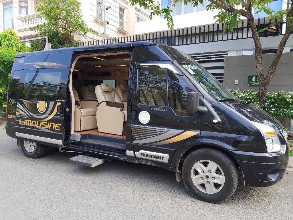Modern high-roof 9-seater limousine fleet providing executive chauffeur airport transfers between Cam Ranh and Nha Trang