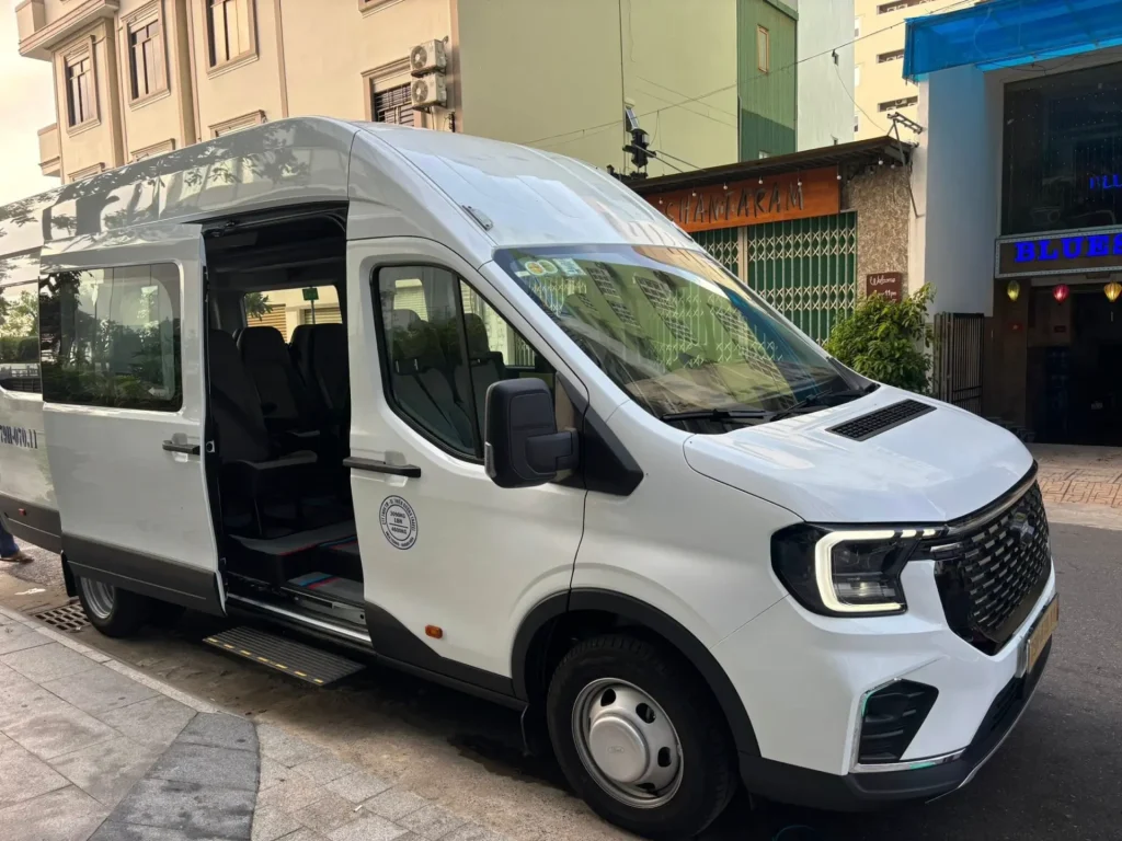 Courteous, experienced local driver welcoming large travel groups and families for private Cam Ranh Airport transfers