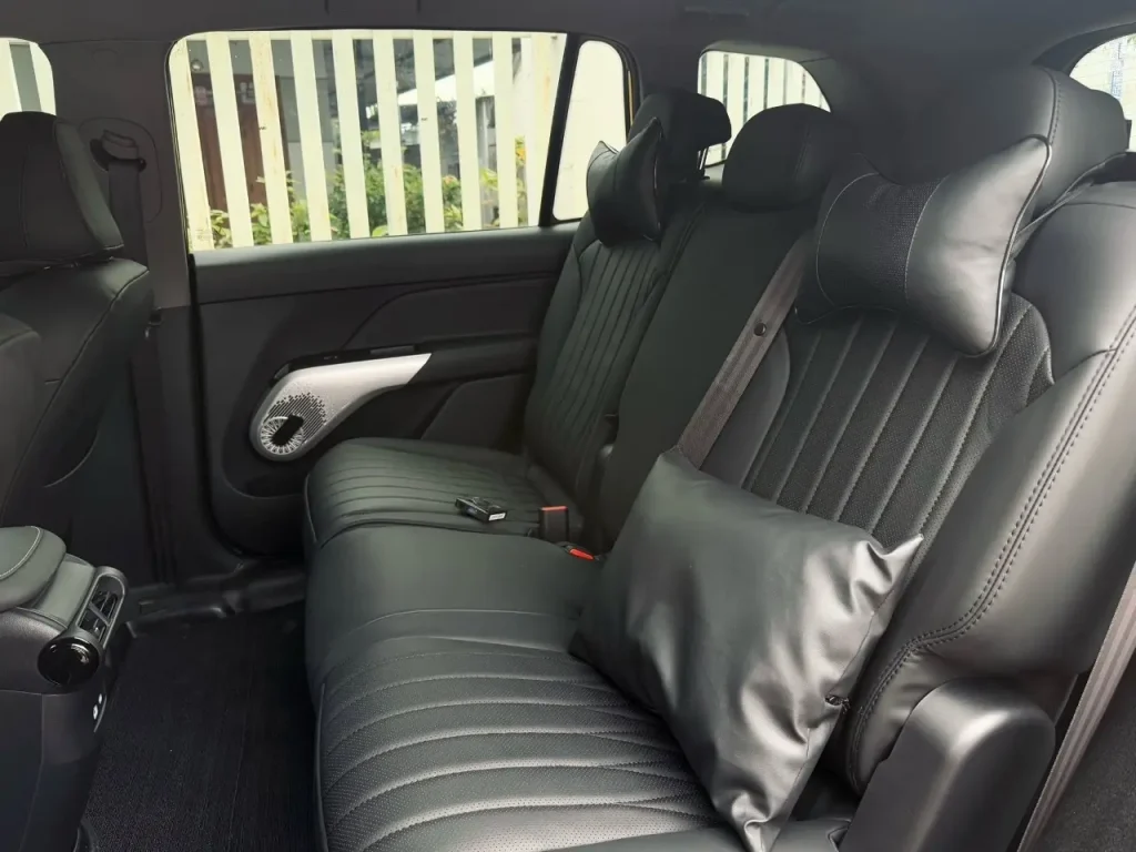 Modern, comfortable leather seating across three rows inside the VinFast Limo Green 7-seater electric MPV